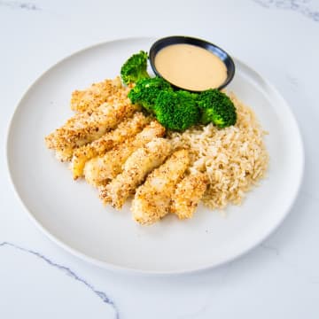 Almond Fish sticks with Brown rice and Broccoli. Side of mustard dressing